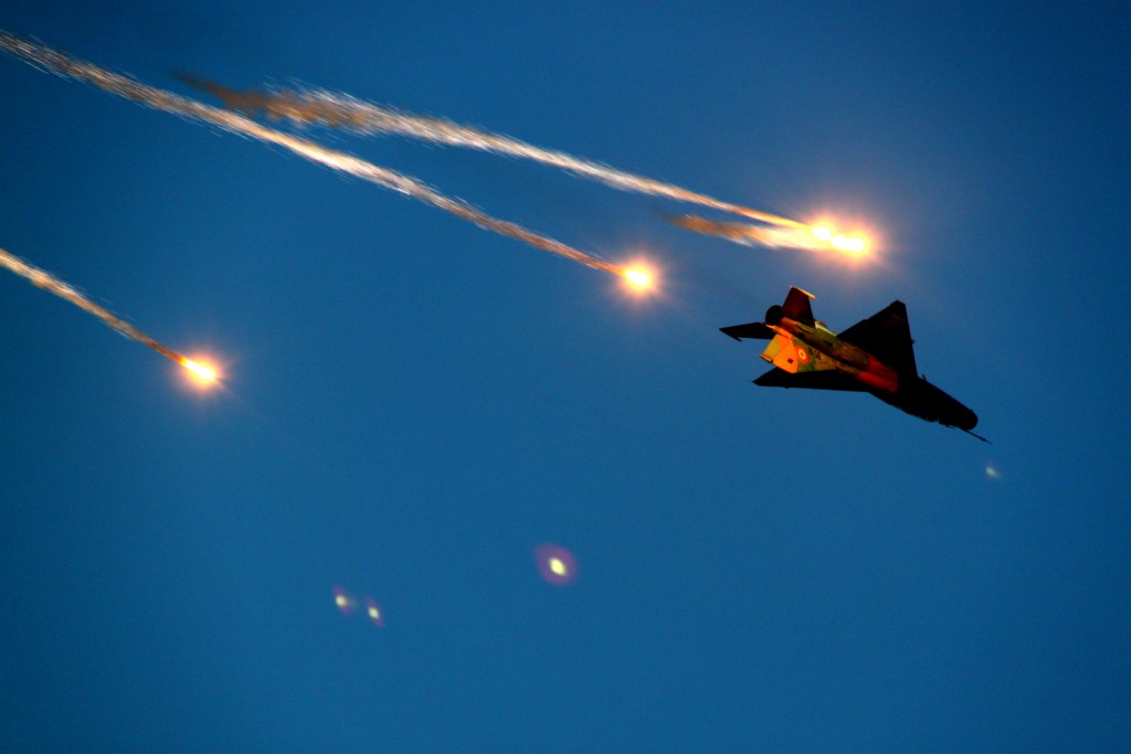 MiG 21 "Lancer" releasing flares during a roll - BIAS 2015