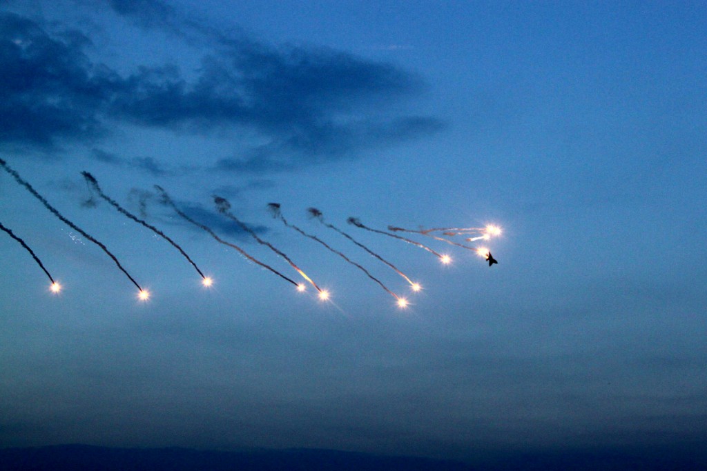 MiG 21 "Lancer" releasing flares during a roll- BIAS 2015