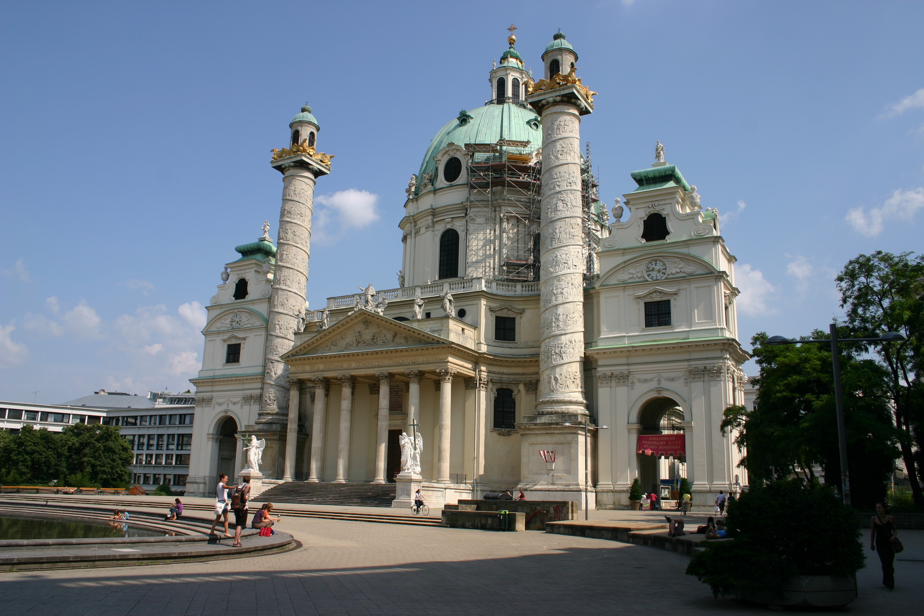 Karlskirche, Vienna - my favorite church in Vienna. Read the article to discover why I like it so much and to see the other five top places to visit in Vienna - my favorite ones. #Vienna #travel #Viennaattractions #viennaitinerary