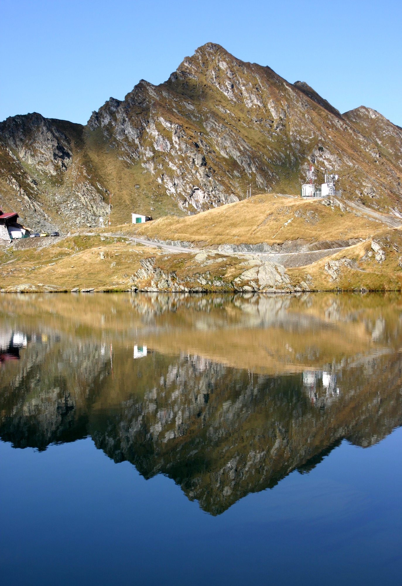 Impressive mountain reflection at Balea Lake, Romania