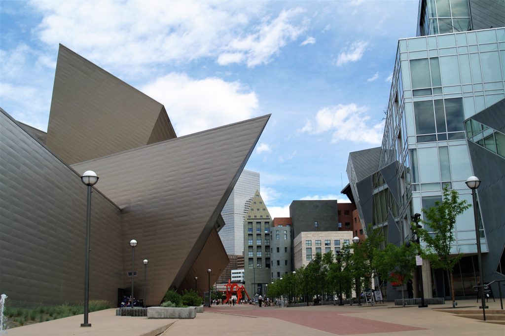 Denver Art Museum framing up the Denver Library - what to do in Denver