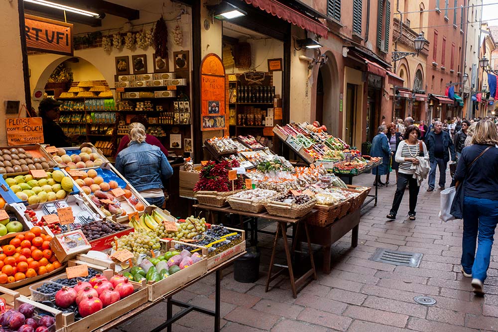 Food Shopping in the Quadrilatero, Bologna. Read this insider's guide to Bologna Italy and discover more things to in Bologna, accommodation in Bologna, food in Bologna, and off the beaten path attractions in Bologna. #bologna #italy #bolognaguide #europe #bolognatraveling #bolognatravel