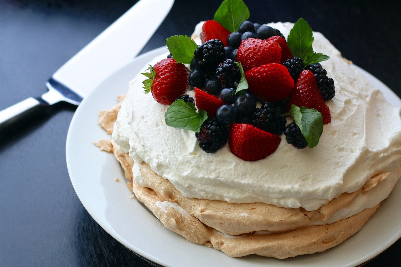 Pavlova is the most famous Australian dessert. Discover 11 more foods to try in Australia from this article