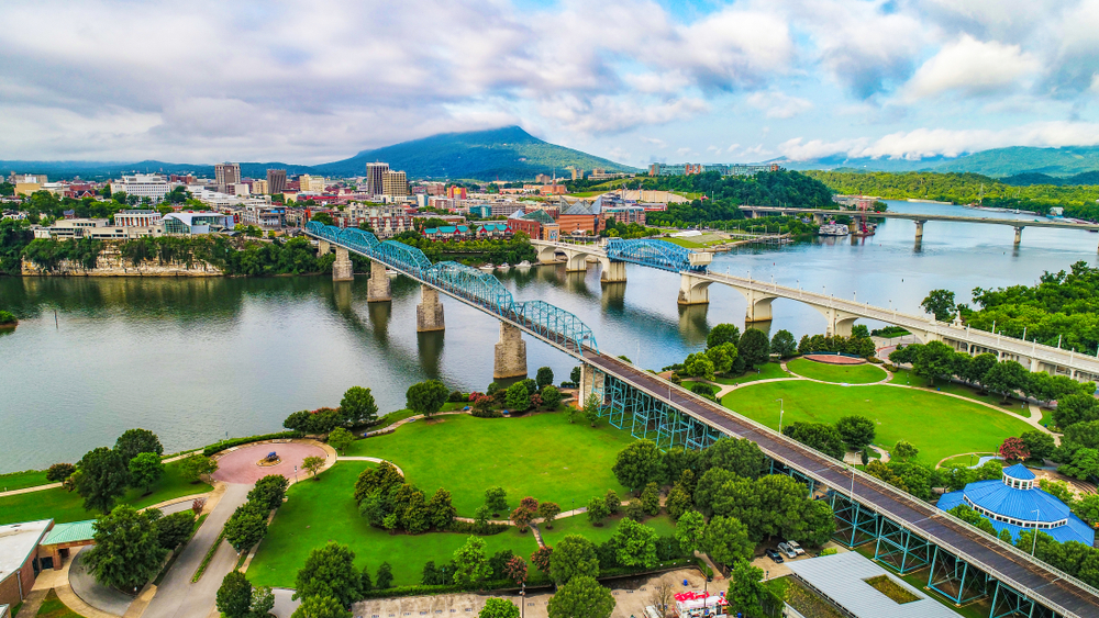 Drone Aerial of Downtown Chattanooga TN Skyline, Coolidge Park and Market Street Bridge