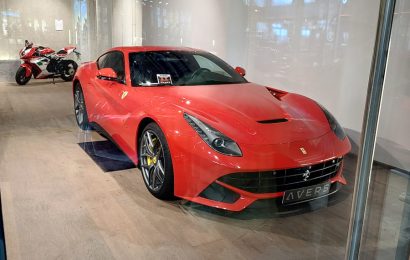 This Place in Munich Lets You Walk Among Ferraris, McLarens, Classic Cars, and F1 Cars – for Free