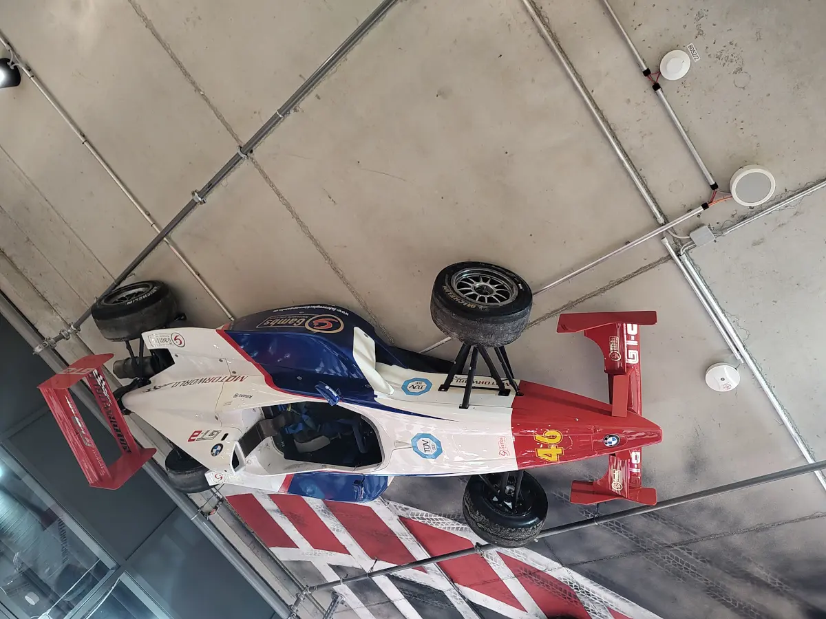 Free Automotive Museum in Munich With Legendary Cars Motorworld Munich Free things to do in Munich Formula car on the ceiling