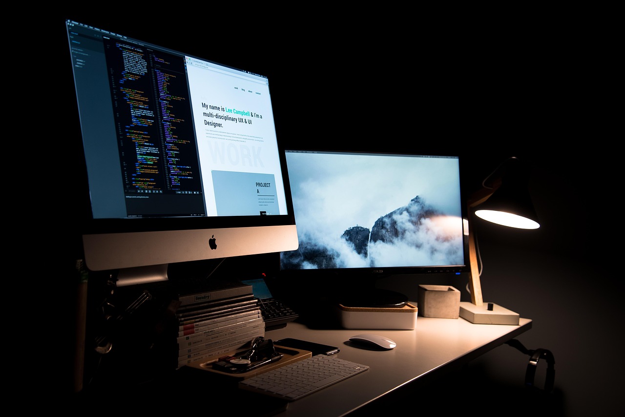 Computer screens emitting blue light at night that disrupts melatonin production and healthy sleep