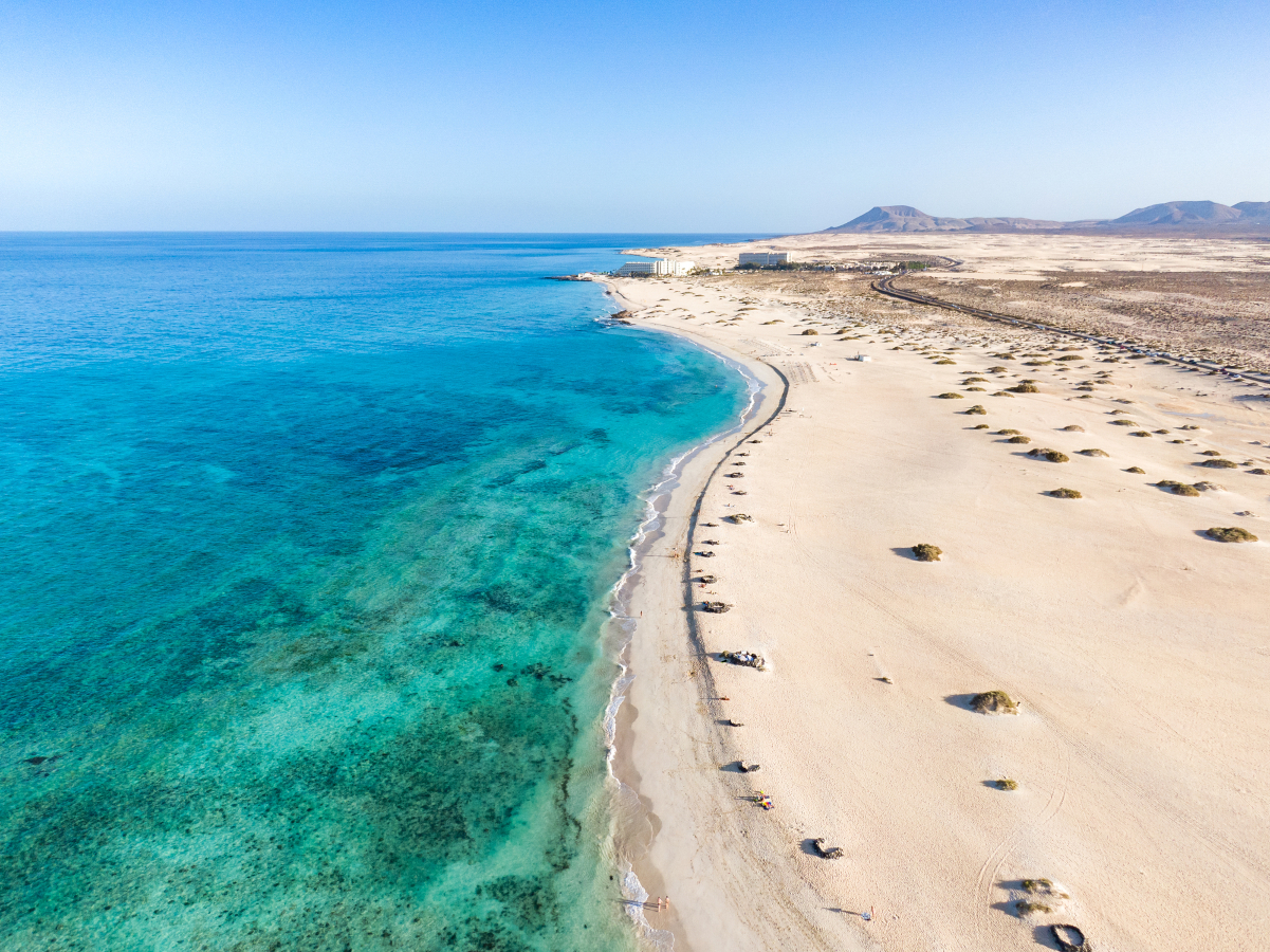 top things to see in Spain - 100 attractions in Spain - View of Corralejo National Park Parque Natural de Corralejo with sand dunes located in the northeast corner of the island of Fuerteventura, Canary Islands, Spain.