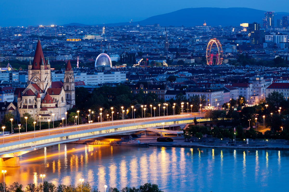 Vienna illuminated at night before an unexpected security incident at a city attraction