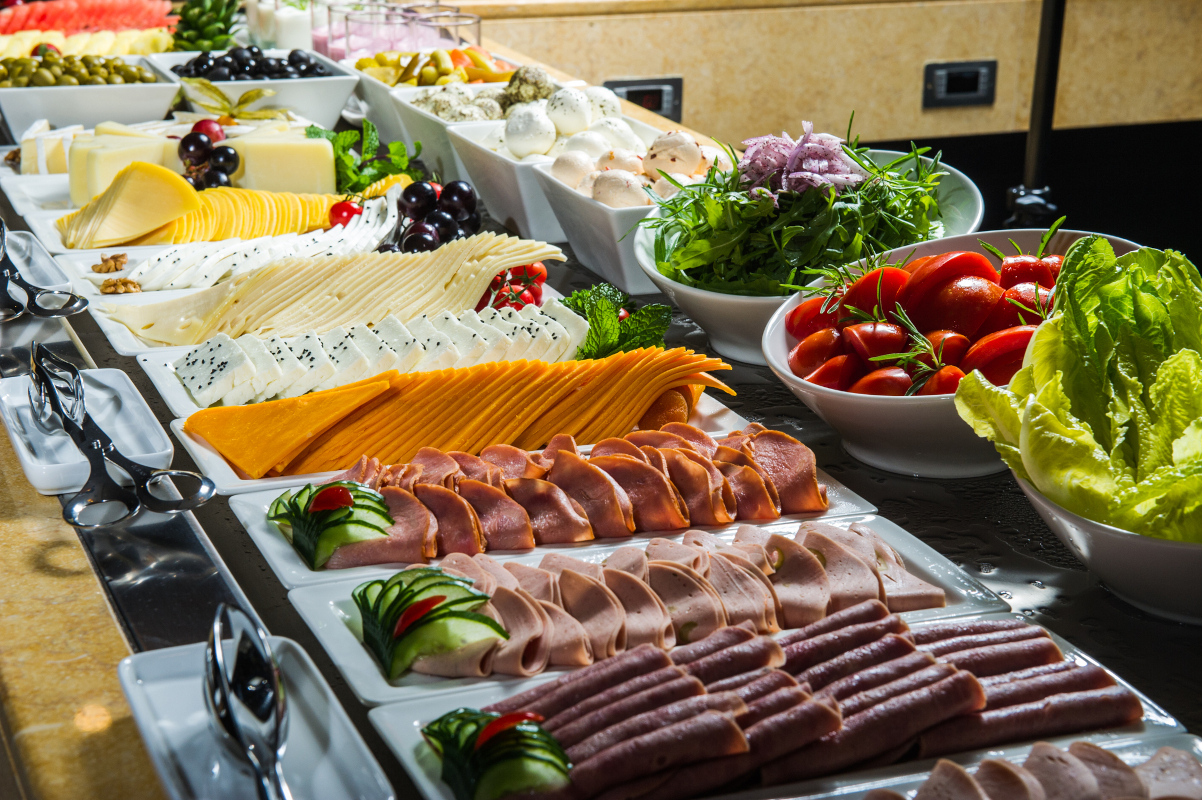 Hotel breakfast with diferent appetizers as a travel expense to budget for before a trip