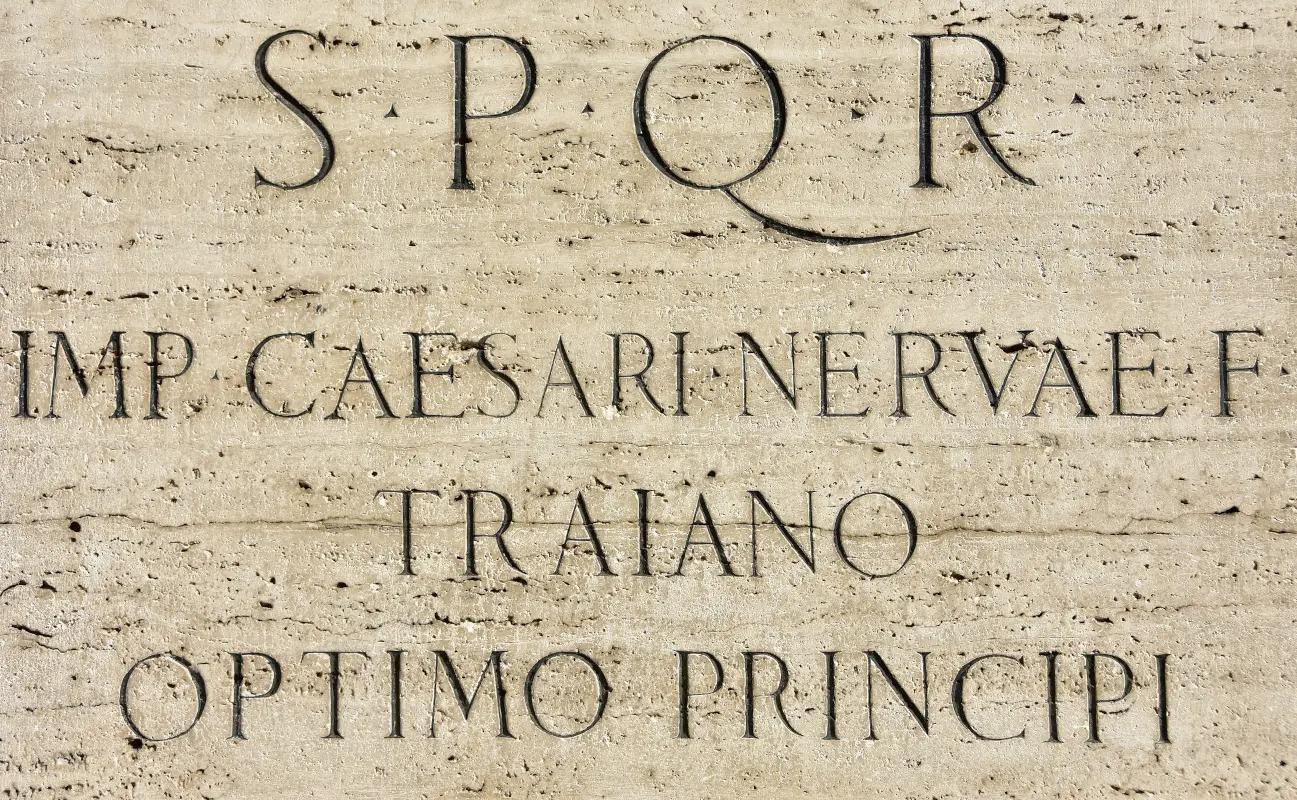 Latin inscription with SPQR carved on a Roman monument