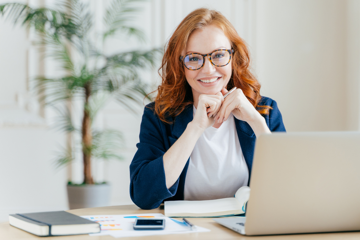 Businesswoman evaluating the finances of an online business