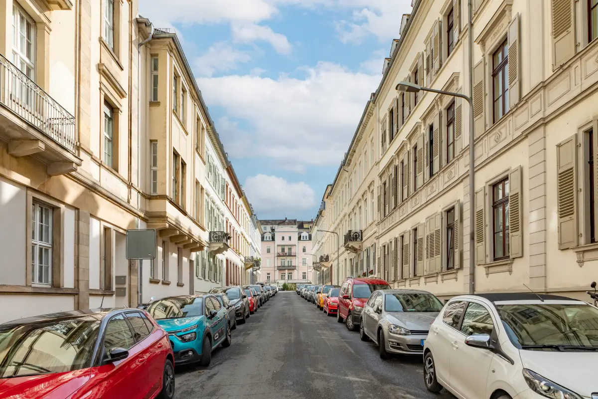 Cars parked along a narrow historic street in Wiesbaden, Germany