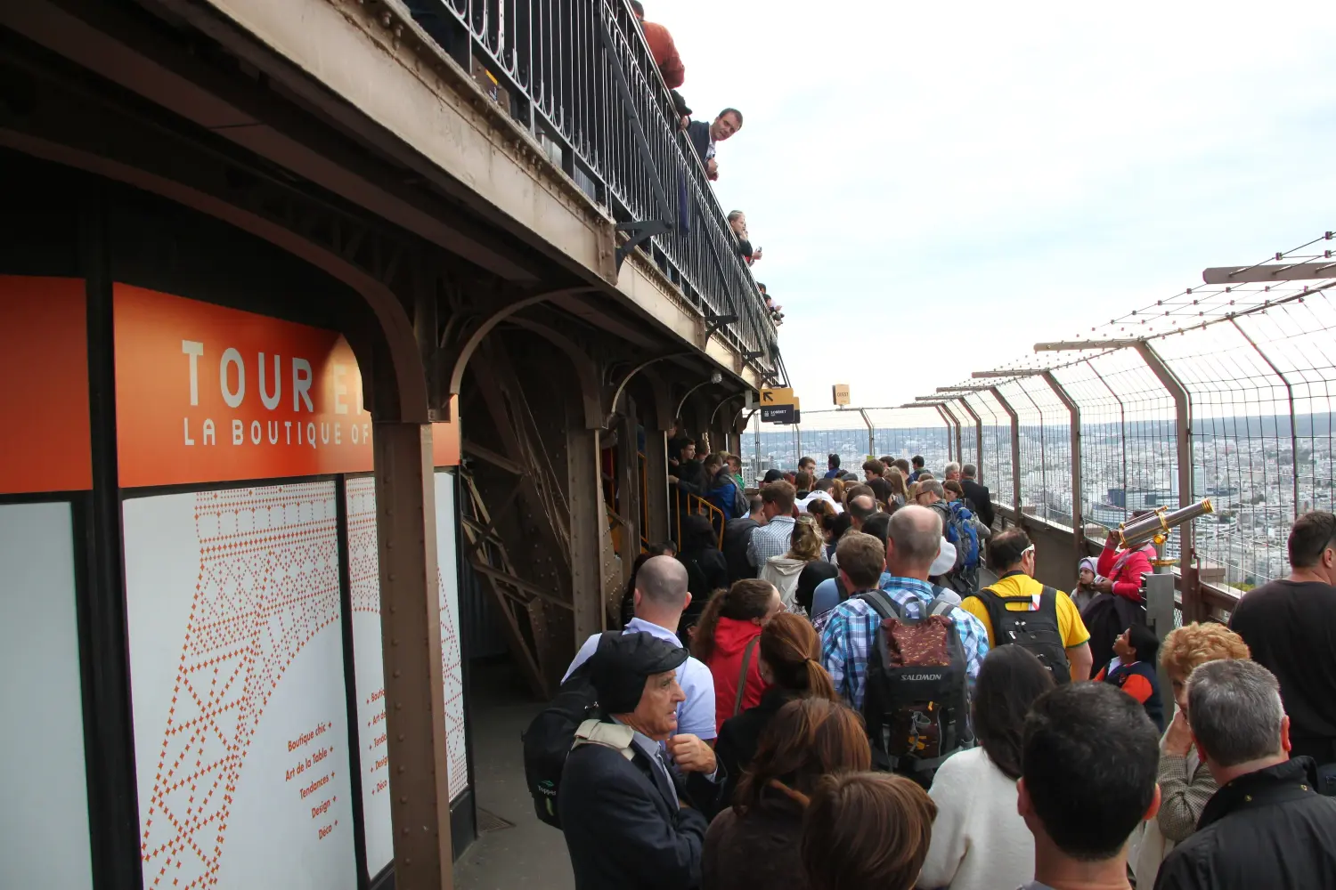 Visitors waiting for the summit elevator on the Eiffel Tower second floor