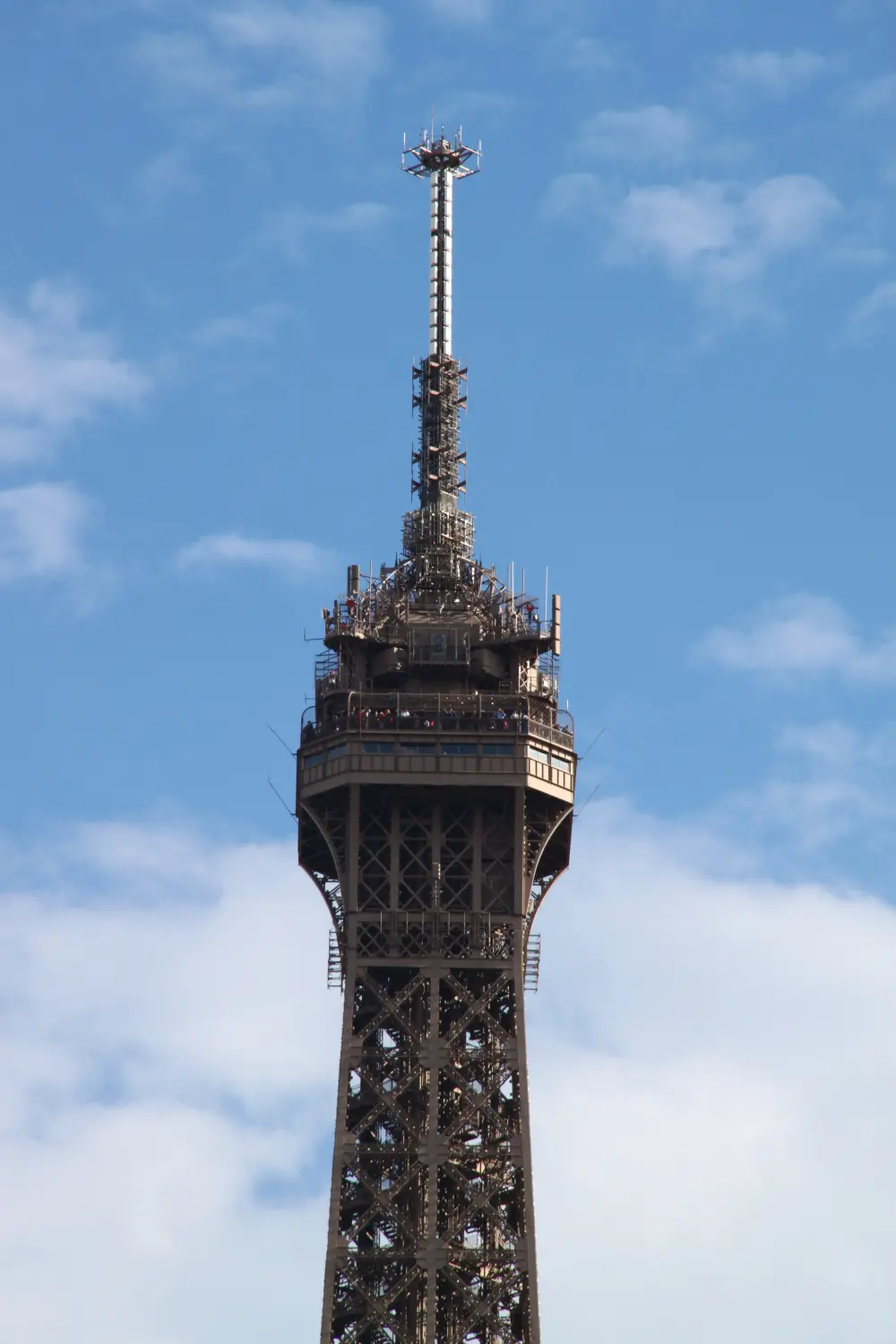 Close view of the Eiffel Tower summit and its observation platform