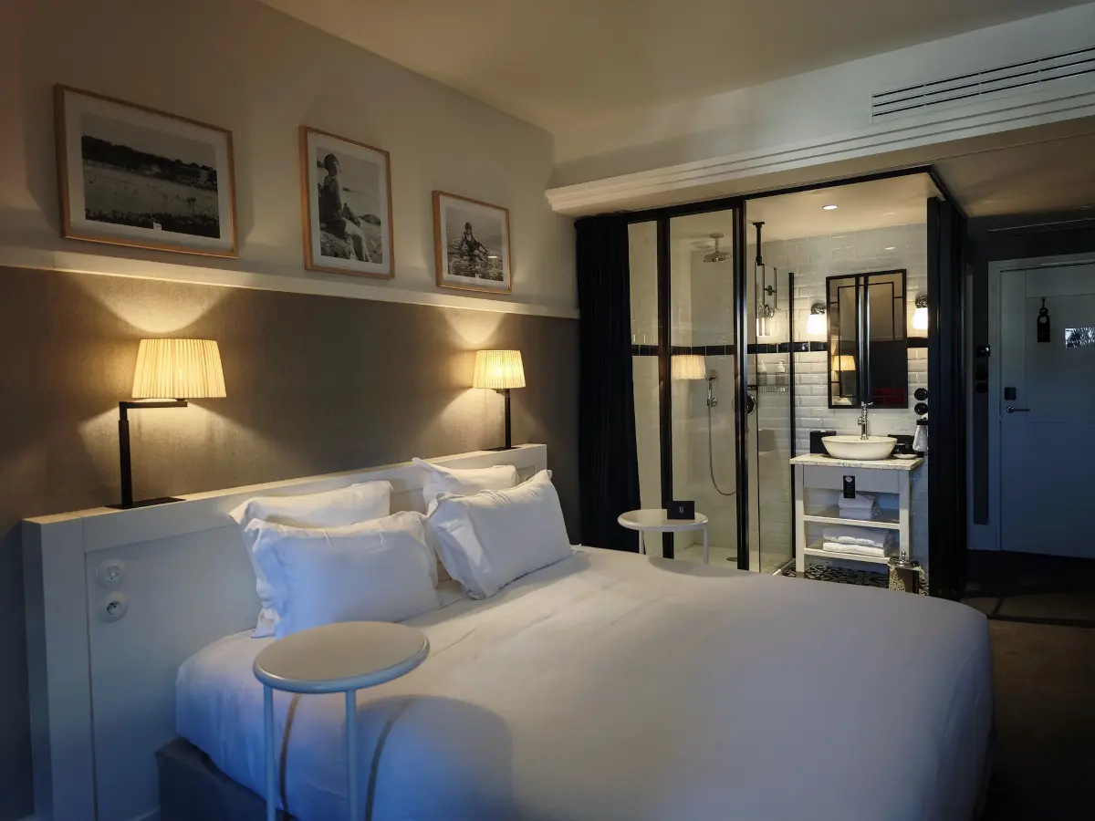 Paris hotel - style glass wall enclosure for en-suite bathroom - Editorial Photo