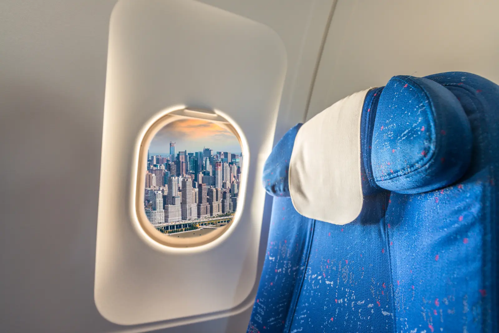 Airplane seat inside a passenger cabin during a flight