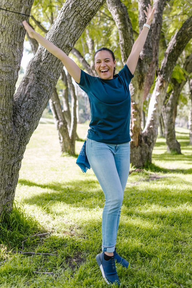 woman in a park happy healthy