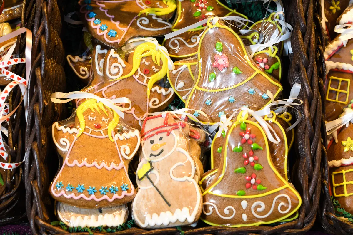 Decorated gingerbread cookies in different shapes displayed for sale at a Christmas market in Vienna