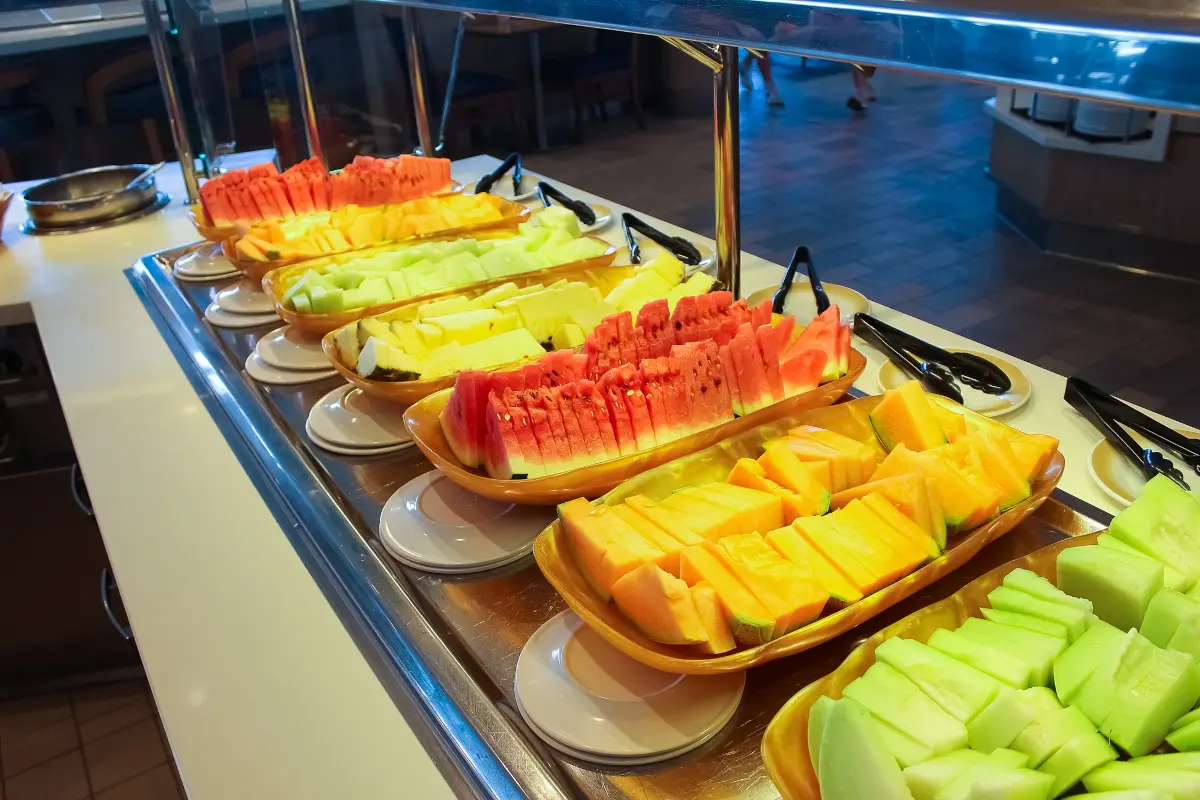 Fresh vegetables and fruit displayed at a cruise ship buffet
