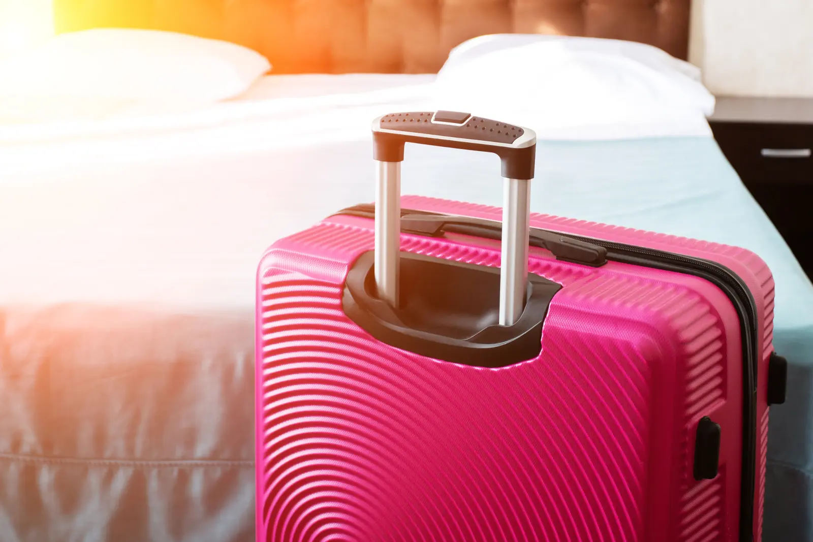 Suitcase and luggage inside a hotel room