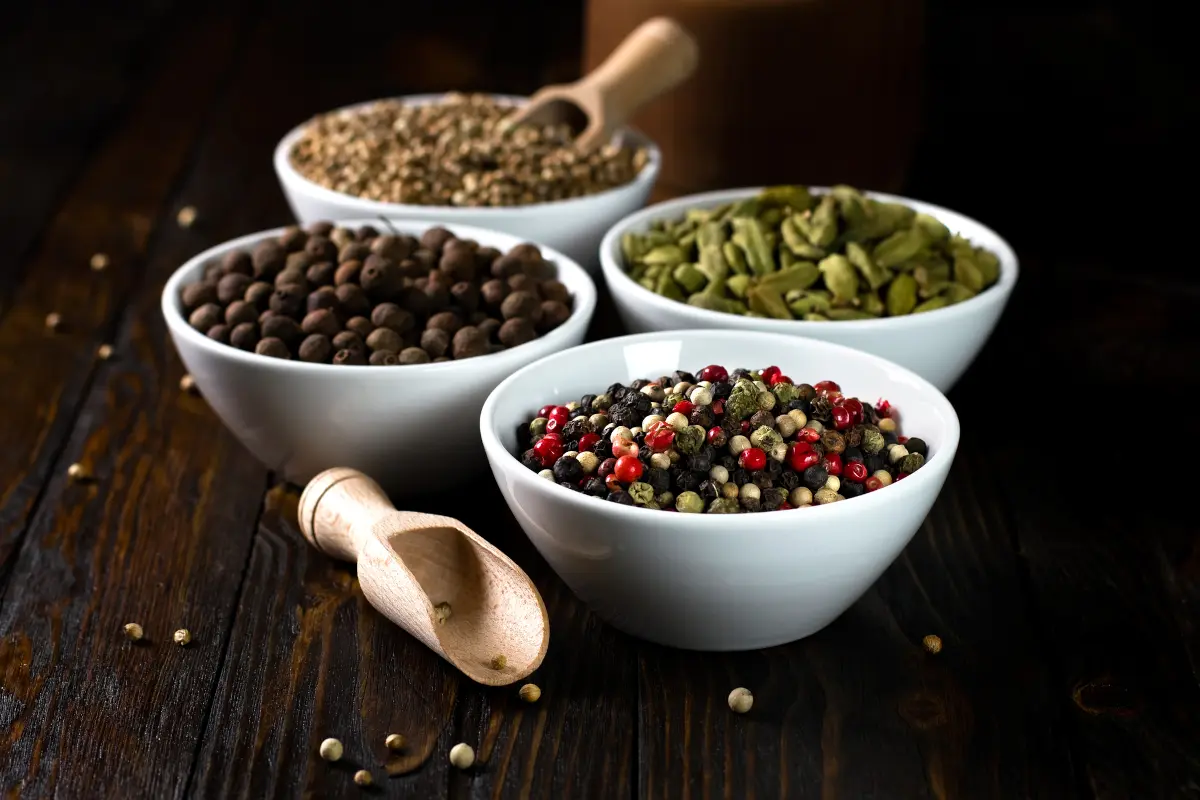 Assortment of aromatic spices and seasonings for a Thanksgiving scent guessing game