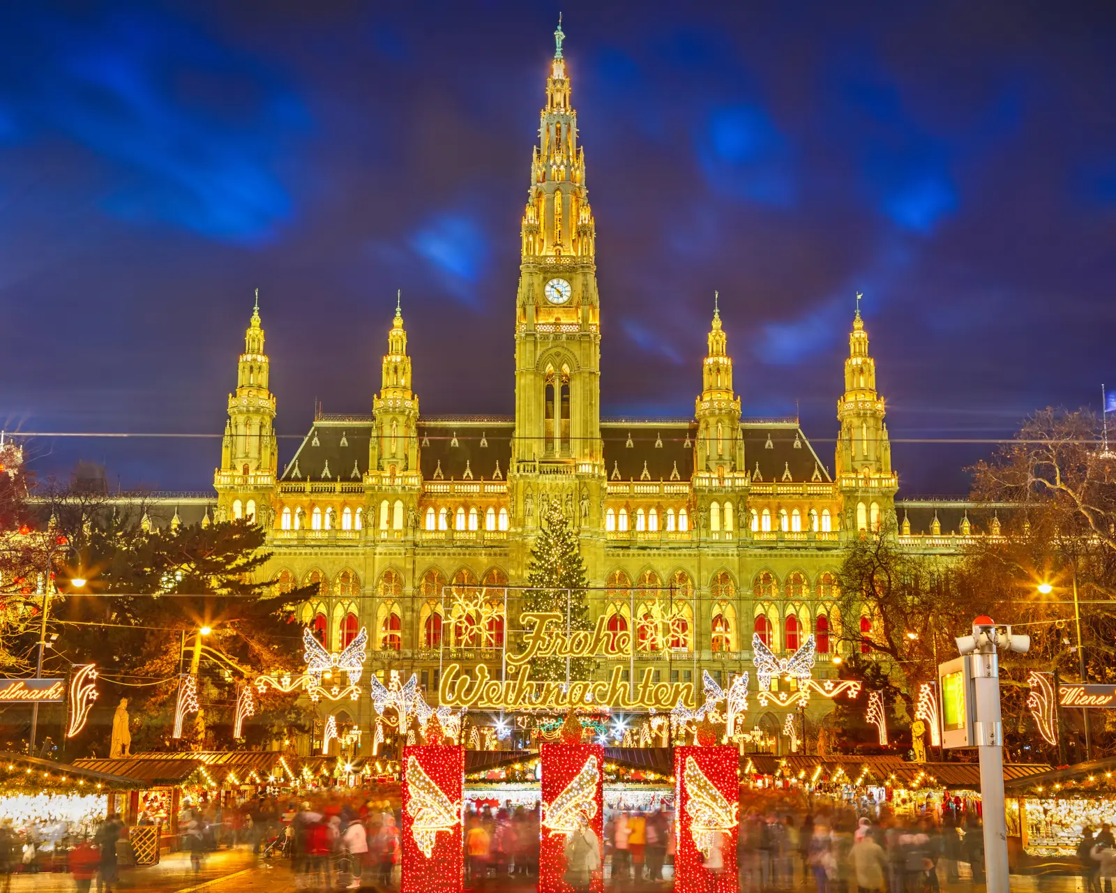 Vienna Christmas market at Rathausplatz with festive stalls in front of City Hall